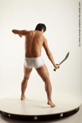 Underwear Fighting with knife Man Asian Average Medium Black Academic
